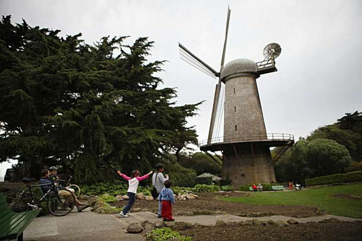 Visitors to the west end of Golden Gate Park enjoy the Dutch Windmill and the Queen Wilhelmina Garden in San Francisco, Calif. on Sunday October 18, 2009.