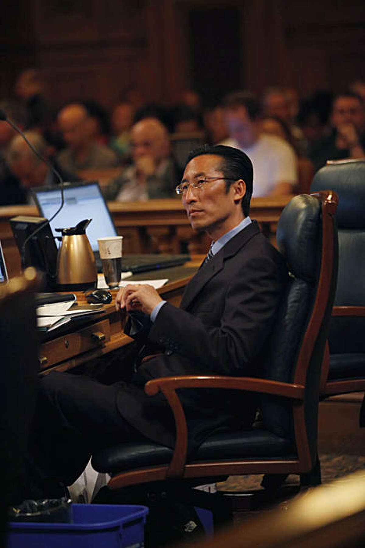 Supervisor Eric Mar listens to a speaker during the San Francisco Board of Supervisors meeting at City Hall in San Francisco, Calif. on Tuesday May 4, 2010.