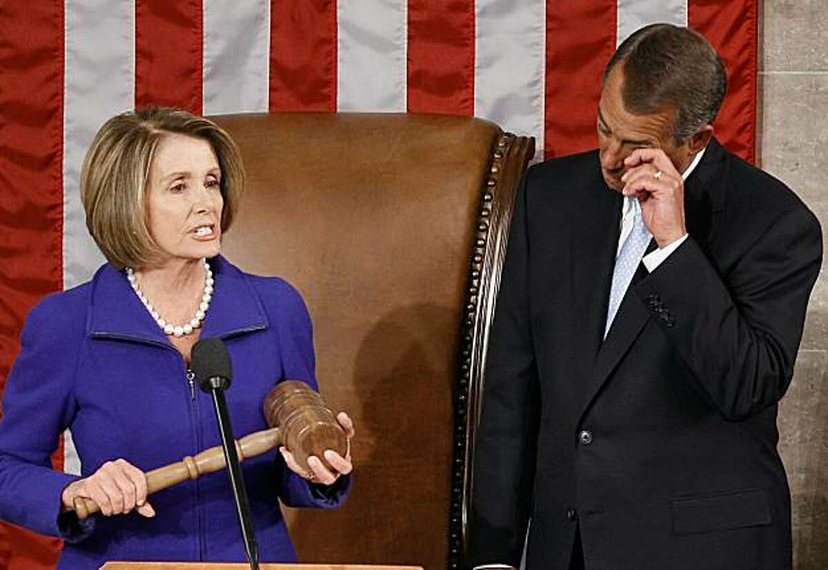 WASHINGTON, DC - JANUARY 05: Speaker of the House John Boehner (R-OH) (R) wipes his eyes as outgoing Speaker of the House Nancy Pelosi (D-CA) (L) prepares to hand over over the Speaker's gavel following his election in the House chamber January 5, 2011 in Washington, DC. The 112th U.S. Congress was sworn-in today, with Republican legislators taking control of the House of Representatives and expected to begin attempts to dismantle portions of U.S. President Barack Obama.s legislative agenda.