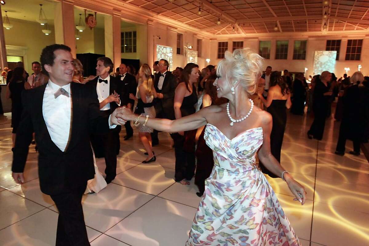 jorge Maumer and Daru kawalkowski dance at a party at City Hall after the 99th San Francisco Symphony Gala at Davies Symphony Hall in San Francisco, Calif., on Tuesday, September 7, 2010.