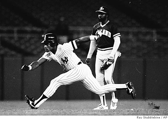 Oakland A's star Rickey Henderson carries daughter Alexis, 13 months,  through Pearson airport last night – All Items – Digital Archive Ontario