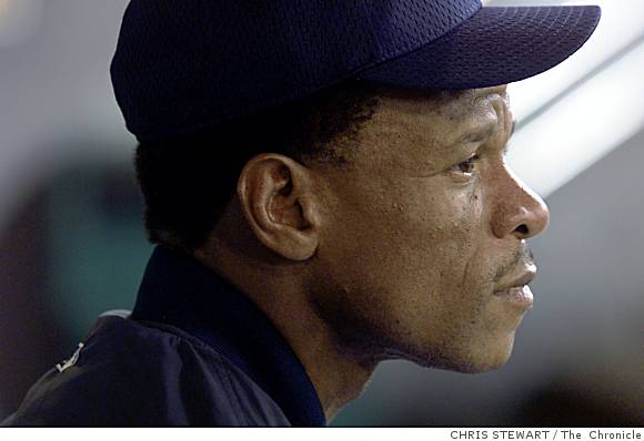 Oakland A's star Rickey Henderson carries daughter Alexis, 13 months,  through Pearson airport last night – All Items – Digital Archive Ontario