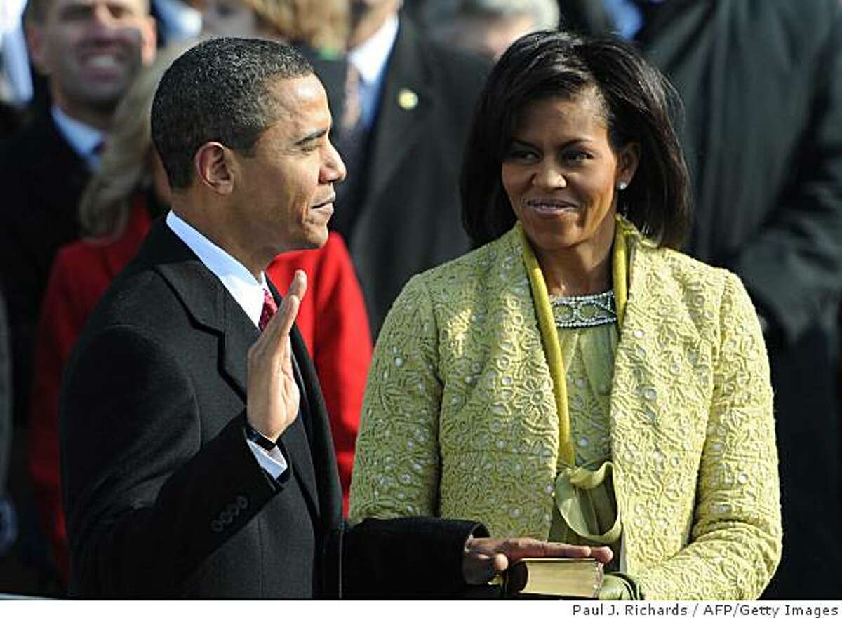 Barack Obama is sworn in as the 44th US president by Supreme Court Chief Justice John Roberts.