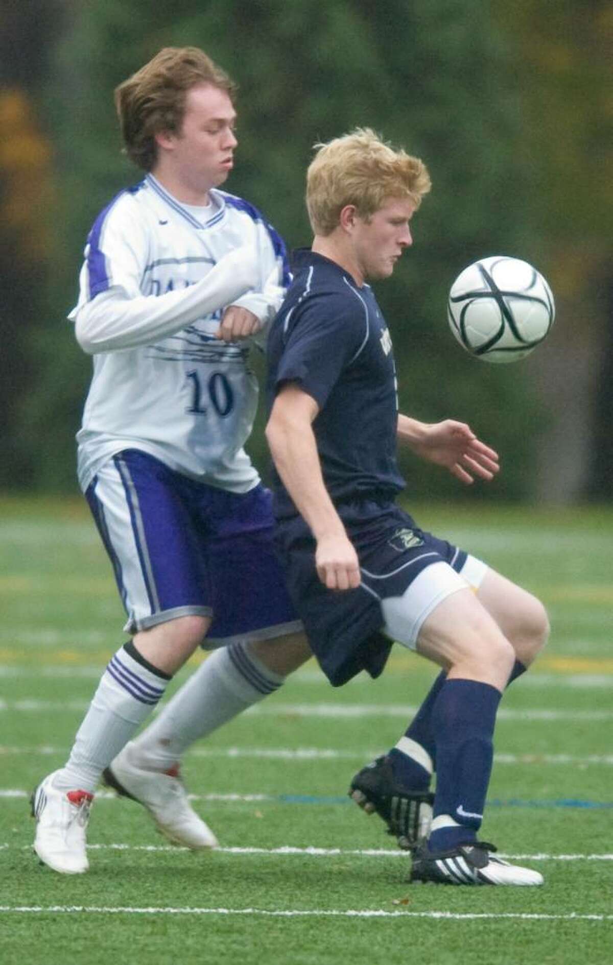 Master's G. Meads, left, and King's Matt Johnson, right, during an FAA soccer game at King in Stamford, Conn. on Tuesday, Oct. 27, 2009.