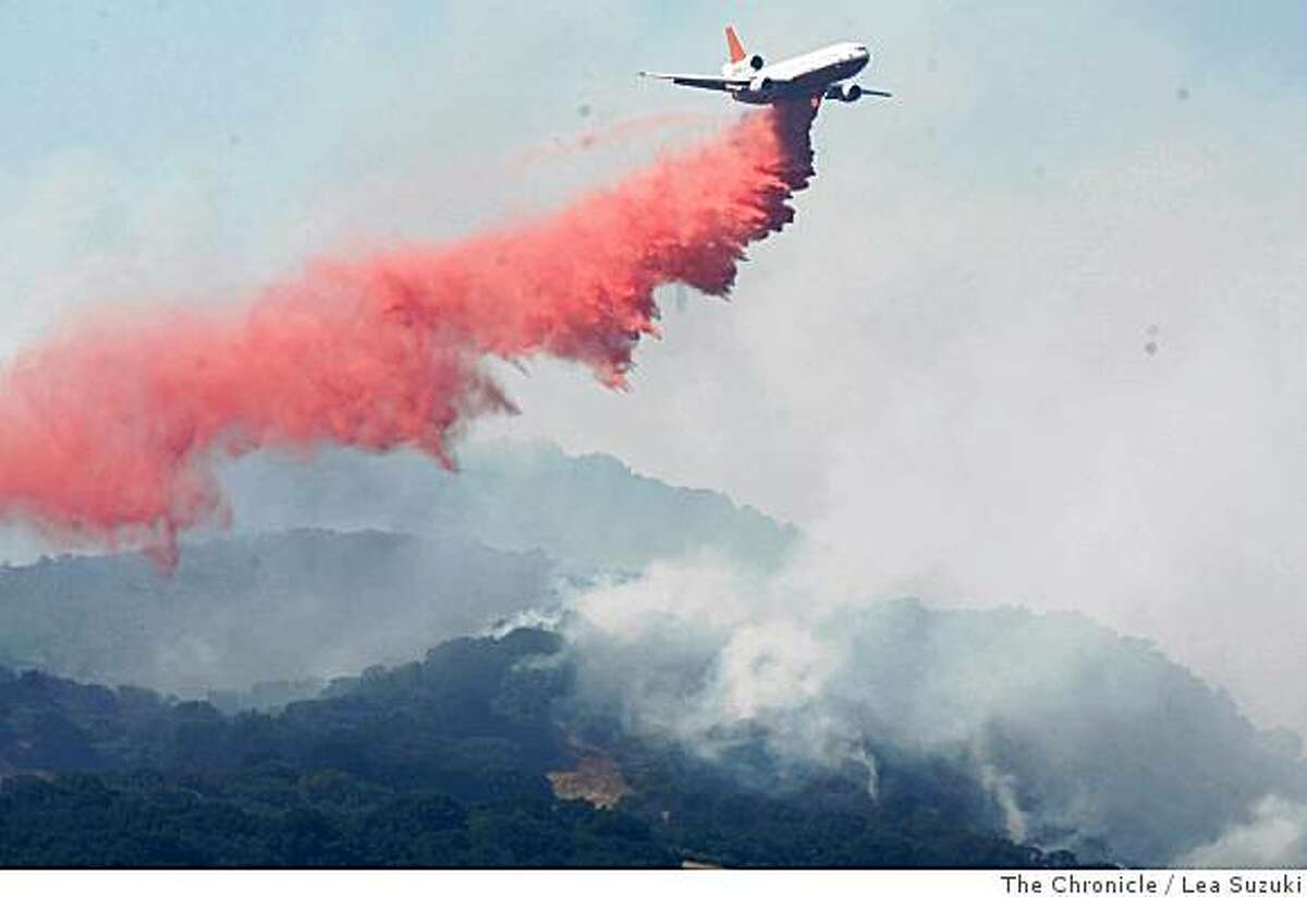 A DC-10 drops fire retardant on the fire in Green Valley, Calif. on Sunday June 22, 2008. Photo By Lea Suzuki/ The Chronicle