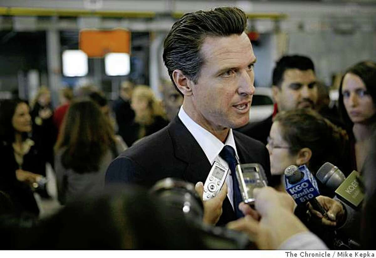 In front of a crowd of city employees and press, San Francisco Mayor, Gavin Newsom addresses his new budget plan in the San Francisco Police Department Tactical Operations center located in Hunters Point Shipyard on Monday, June 1, 2008, in San Francisco,Calif.