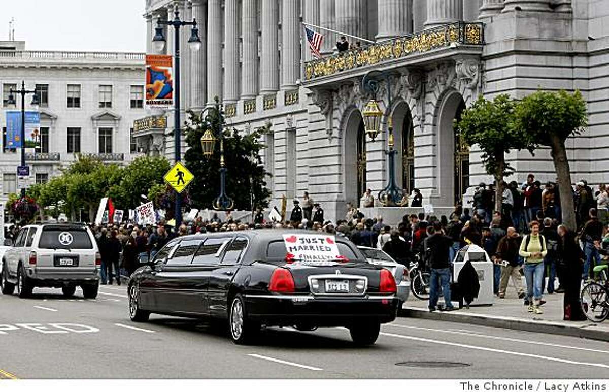 A limousine drives by protestors and supporters outside City Hall, Monday June 16, 2008, in San Francisco, Calif. Lacy Atkins /The San Francisco Chronicle