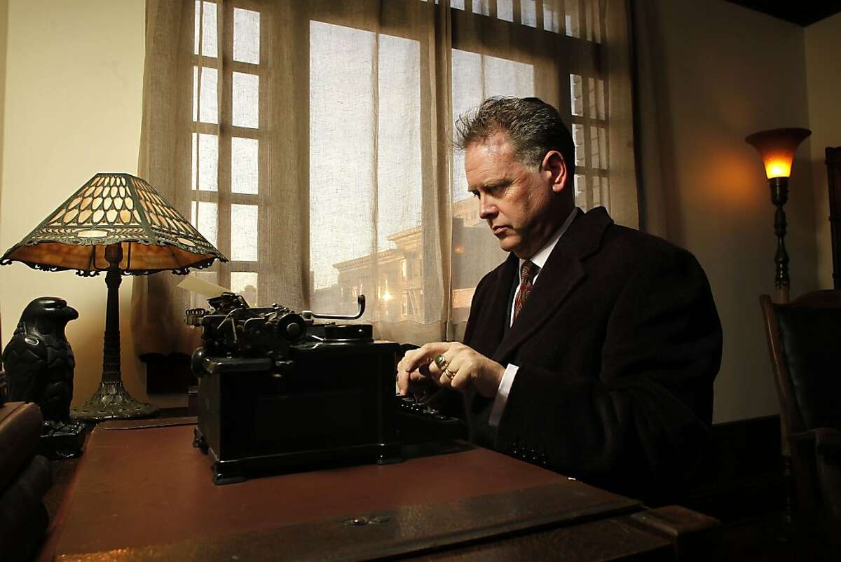 Eddie Muller at the typewriter and desk, inside Dashiell Hammett's old apartment on Friday December 23, 2011, in San Francisco, Ca., which is now leased by local author Robert Mailer Anderson, who has restored and preserved Hammett's apartment down to the last detail. Interview with Eddie Muller, president of the Film Noir Foundation and director of the 10th Film Noir Film Festival.