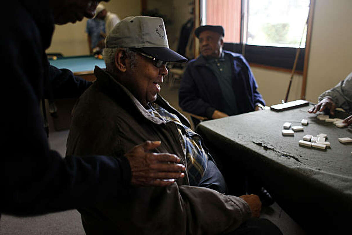 Sherman Taylor, 69, and a 65 year resident of Oakland, joins a group of friends at the dominos table in the game room at the Ira Jinkins Recreation Center on Thursday March 10, 2011 in Oakland, Calif. Recent census statistics show that African Americans are leaving Oakland in records numbers. "It's my home," said Taylor who plans to never leave.