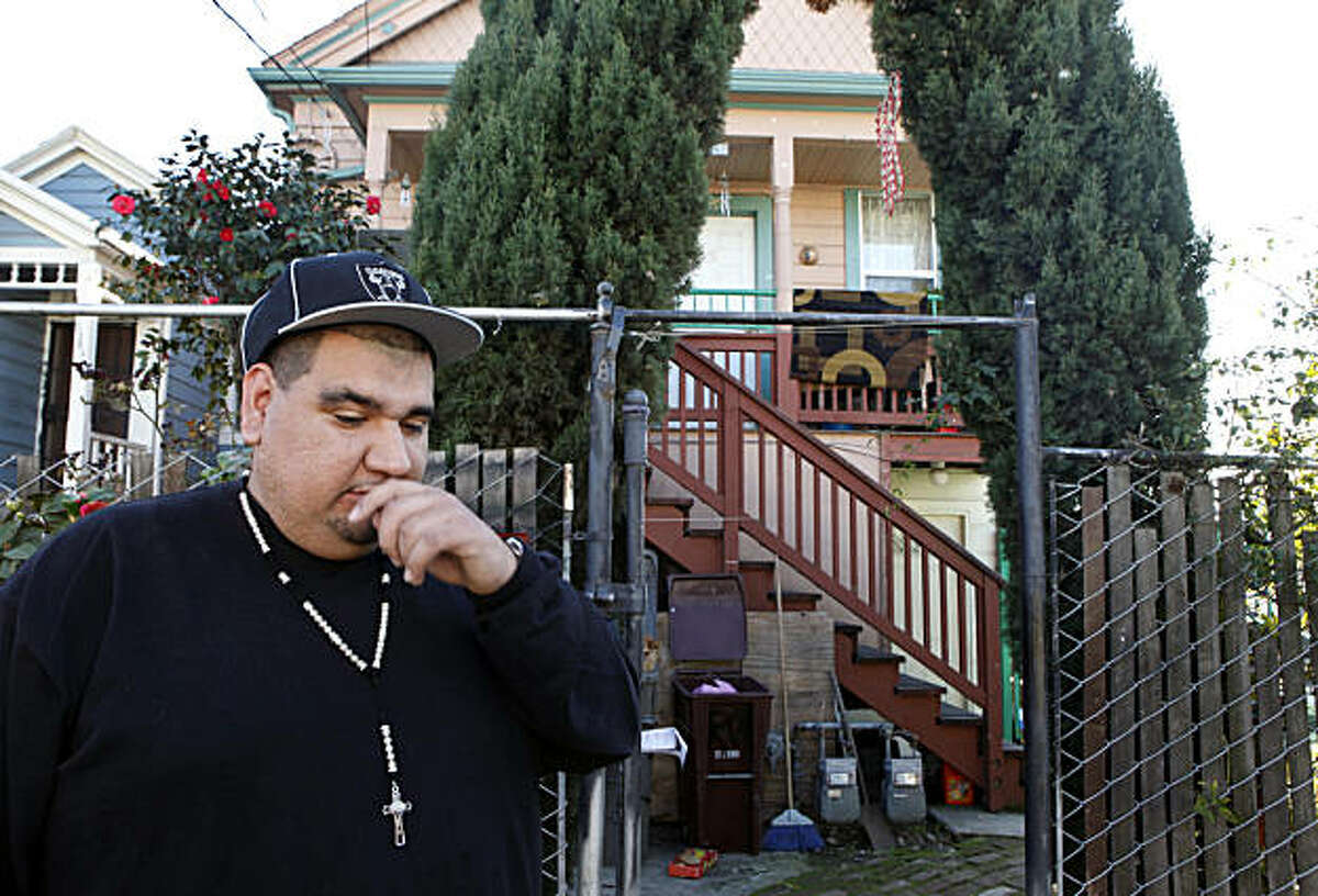 Alejandro Mendoza Velazquez uses a cane to get around his Oakland home. Velazquez was shot in the liver last year while attending a friendÍs funeral. Velazquez finds himself along with thirty-nine others on Oakland City Attorney's John Russo lawsuit list that targets members of the NorteÐos gang in an anti-gang injunction that targets the Fruitvale neighborhood Thursday, Jan. 27, 2011.