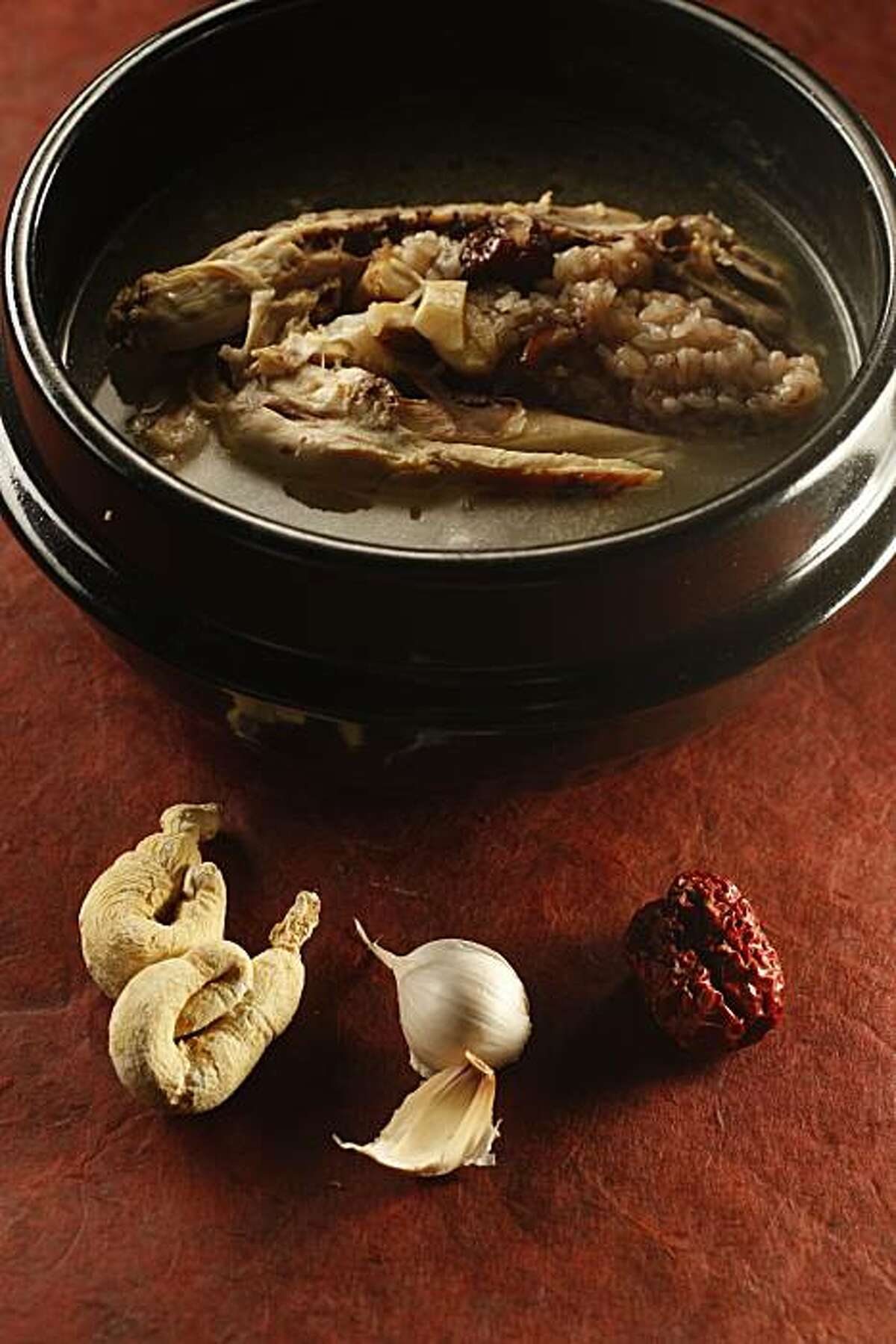 Korean Chicken and Ginseng soup with it's ingredients, in San Francisco, Calif., on January 21, 2009. Food styled by Cindy Lee.