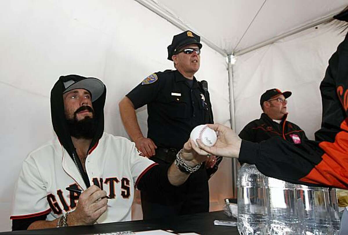 Giants relief pitcher Brian Wilson was one of several dozen players that took part in signing autographs Saturday at AT&T Park.