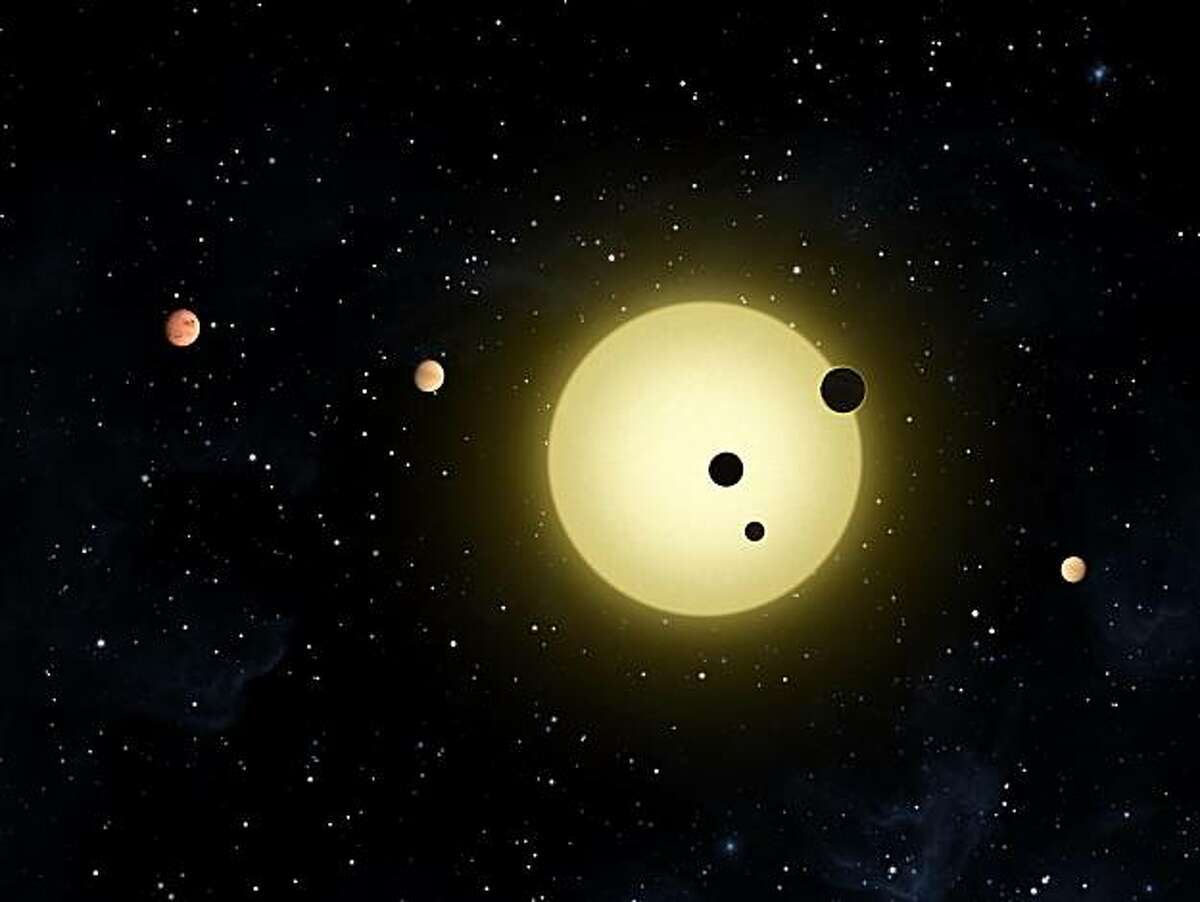 This is a NASA illustration of the newly discovered 6-planet "solar system" around a sun-like star 2000 light years away.