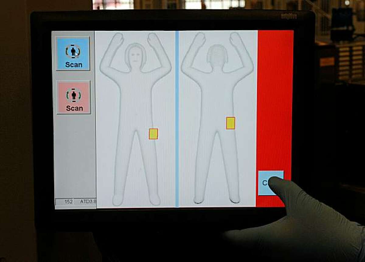 LAS VEGAS, NV - FEBRUARY 01: A monitor shows a generic body image from an advanced image technology (AIT) millimeter wave scanner using new Automated Target Recognition software being tested by the U.S. Transportation Security Administration at McCarranInternational Airport February 1, 2011 in Las Vegas, Nevada. The new software detects potential threat items and displays them on the outline of a generic body displayed on a monitor attached to the unit instead of using passenger-specific images. TSA officers will no longer need to use a remotely located room to view the images, which will make the process more efficient according to a TSA spokesman.