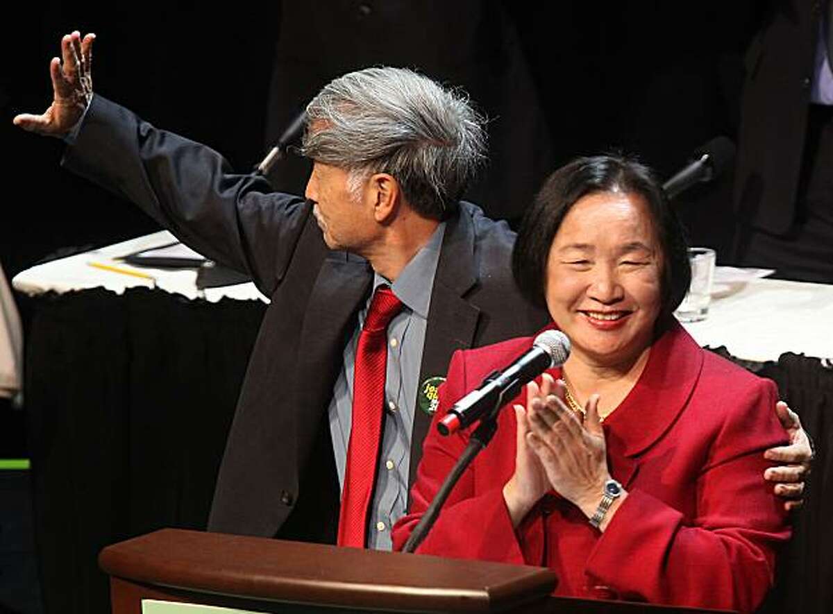 Oakland's new mayor Jean Quan (in red) with husband Floyd Huen after the inauguration at Fox Theater in Oakland, Calif., on Monday, January 3, 2011.