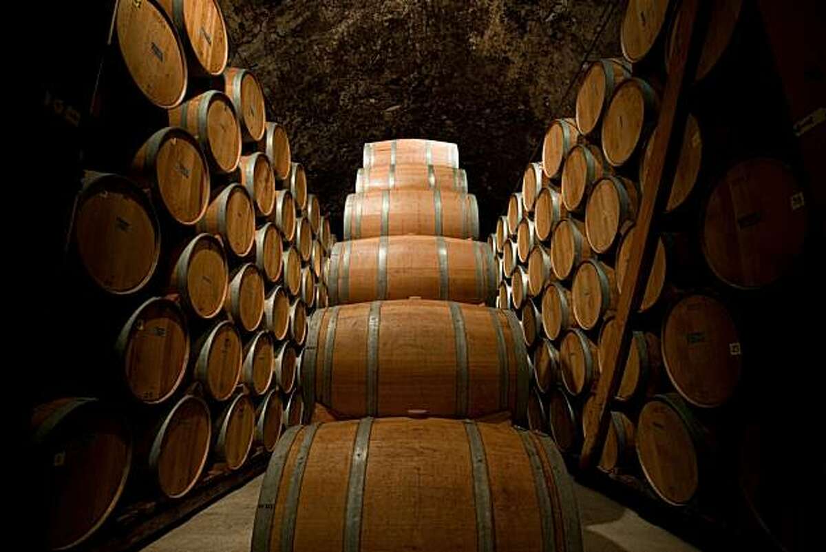 Barrels of zinfandel are piled high deep within the historic cellar of Ridge Vineyards on Wednesday, February 17, 2010.