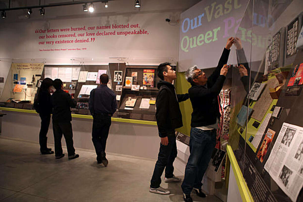 The GLBT (gay, lesbian, bisexual, transexual) history museum will open tomorrow in the Castro in San Francisco, Calif., as exhibition consultant Ramone Silvestre (right) and volunteer Hin Leung (middle, right) do last minute preparations on Tuesday, January 11, 2011.