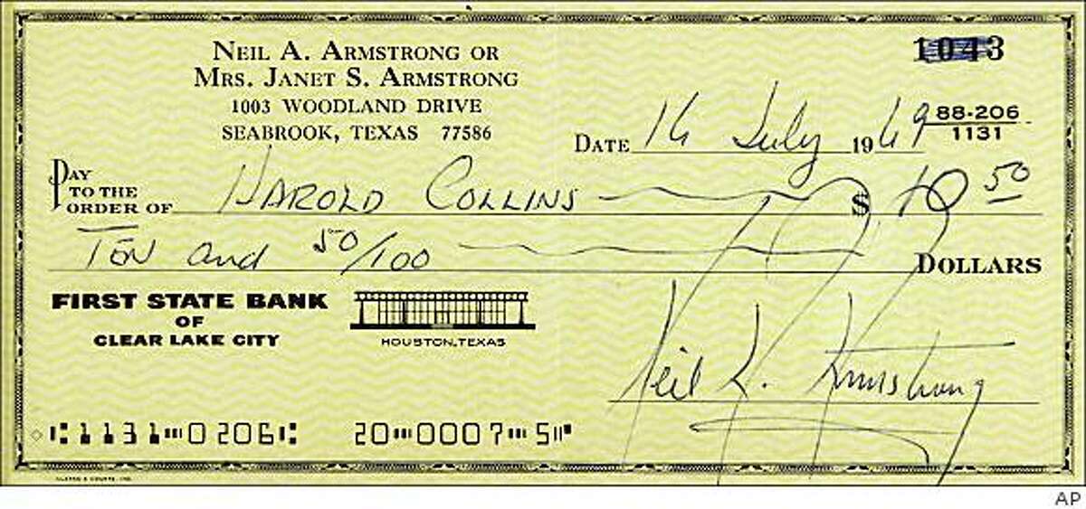 This photo released by Sherry Alpert Corporate Communications for RR Auction on Tuesday, July 14, 2009 shows a check signed by astronaut Neil Armstrong he signed the morning before taking off to be the first man to walk on the moon. The check is being auctioned of by RR Auction in Amherst, N.H. According to the auction house Armstrong wrote it in case anything happened to him on the moon mission, but told the recipient Harold Collins not to cash it because he would return.