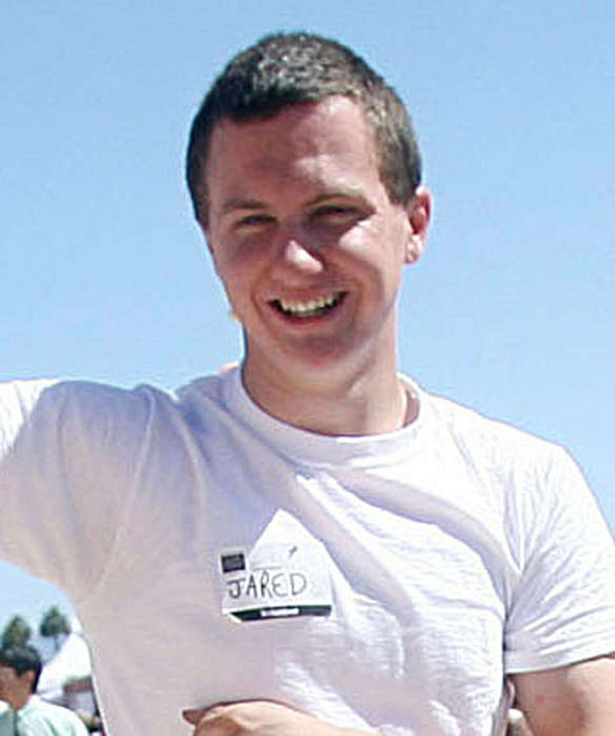 This March 2010 photo shows a man identified as Jared L. Loughner at the 2010 Tucson Festival of Books in Tucson, Ariz. The Arizona Daily Star, a festival sponsor, confirmed from their records that the subject's address matches one under investigation by police after a shooting in Tucson that left U.S. Rep. Gabrielle Giffords wounded and at least five others dead. Police say a suspect is in custody, and he was identified by people familiar with the investigation as Jared Loughner, 22, of Tucson. (AP Photo/Arizona Daily Star, Mamta Popat) NO MAGS, NO SALES, MANDATORY CREDIT