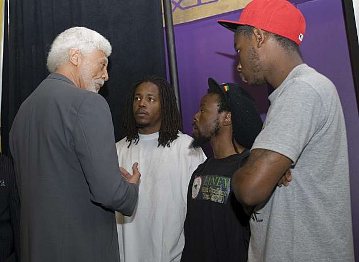 Oakland mayor Ron Dellums (left) speaks with members of the Laney College Black Student Union Michael Walker, Jabari Shaw and Jevon Cochrane (from left to right) press conference on Friday, July 2, 2010 in Oakland, Calif., to urge the public to refrain from violence when the Mehserle verdict is revealed in Los Angeles.