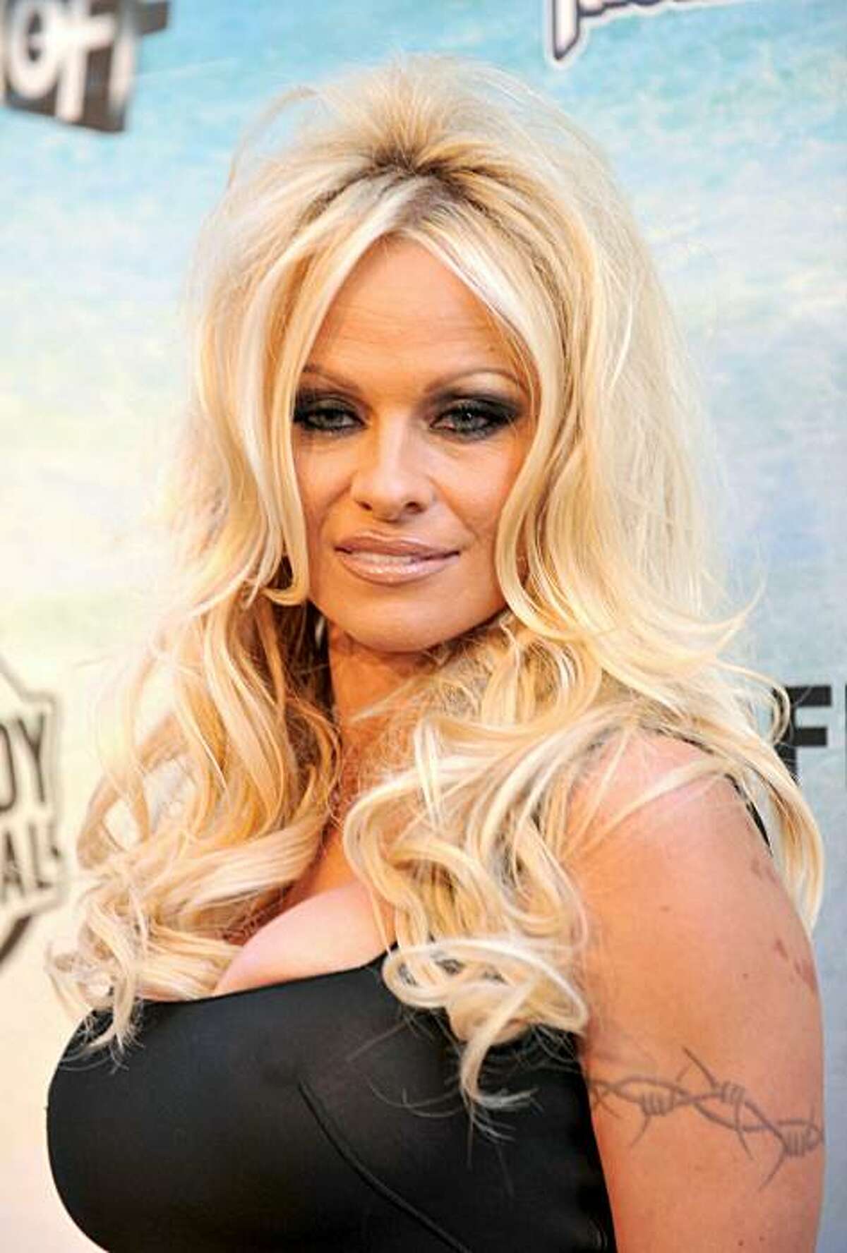 CULVER CITY, CA - AUGUST 01: Actress Pamela Anderson arrives at the Comedy Central Roast Of David Hasselhoff held at Sony Pictures Studios on August 1, 2010 in Culver City, California. The "Comedy Central Roast of David Hasselhoff" will air on Sunday, August 15, 2010 at 10:00 p.m. ET/PT.