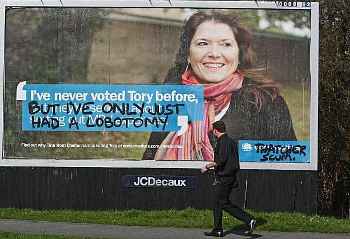 Grafitti which has been spray painted onto a Conservative Party election poster on a roadside billboard in Merseyside, northern England Monday April 12, 2010. Gordon Brown's governing Labour Party trails the main opposition Conservative Party in opinionpolls ahead of the May 6 election, and has made up little ground since he announced the election date last week.