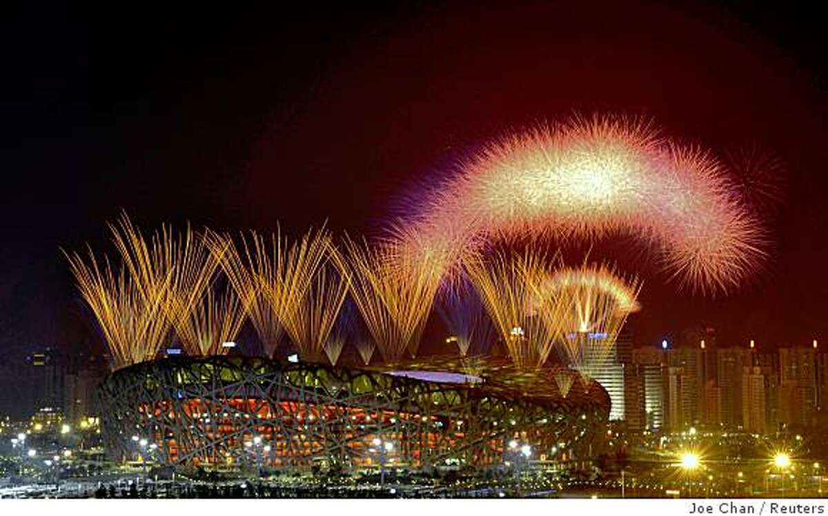 Fireworks explode during the closing ceremony of the Beijing 2008 Olympic Games at the National Stadium, August 24, 2008. The stadium is also known as the Bird's Nest.