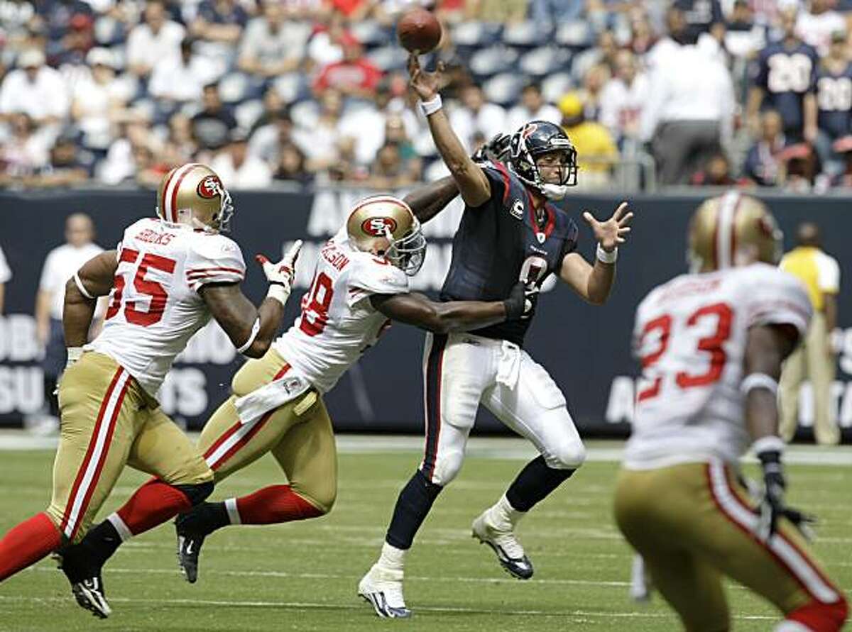 Houston Texans quarterback Matt Schaub (8) is pressured by San Francisco 49ers Parys Haralson (98) and Ahmad Brooks (55) during the 2nd quarter of an NFL football game at Reliant Stadium Sunday, Oct. 25, 2009, in Houston.