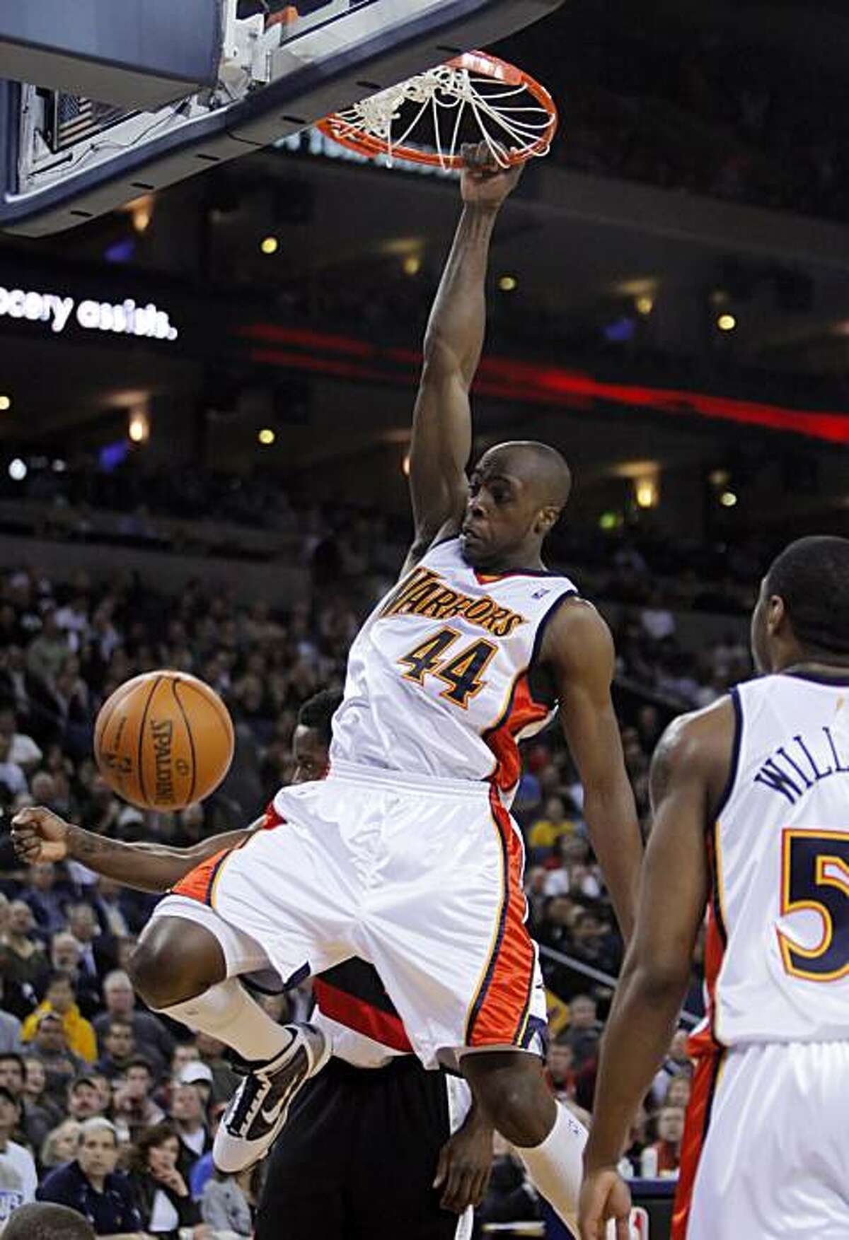 Anthony Tolliver dunks in the first half. The Golden State Warriors played the Portland Trail Blazers at Oracle Pavilion in Oakland, Calif., on March 11, 2010.