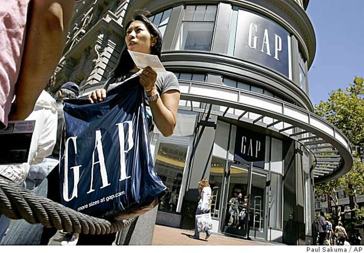 A customer leaves the Gap store in San Francisco, Monday, Aug. 20, 2007. Gap Inc. is expected to report second-quarter earnings after markets close, Thursday, Aug. 23, 2007. (AP Photo/Paul Sakuma)Ran on: 08-24-2007