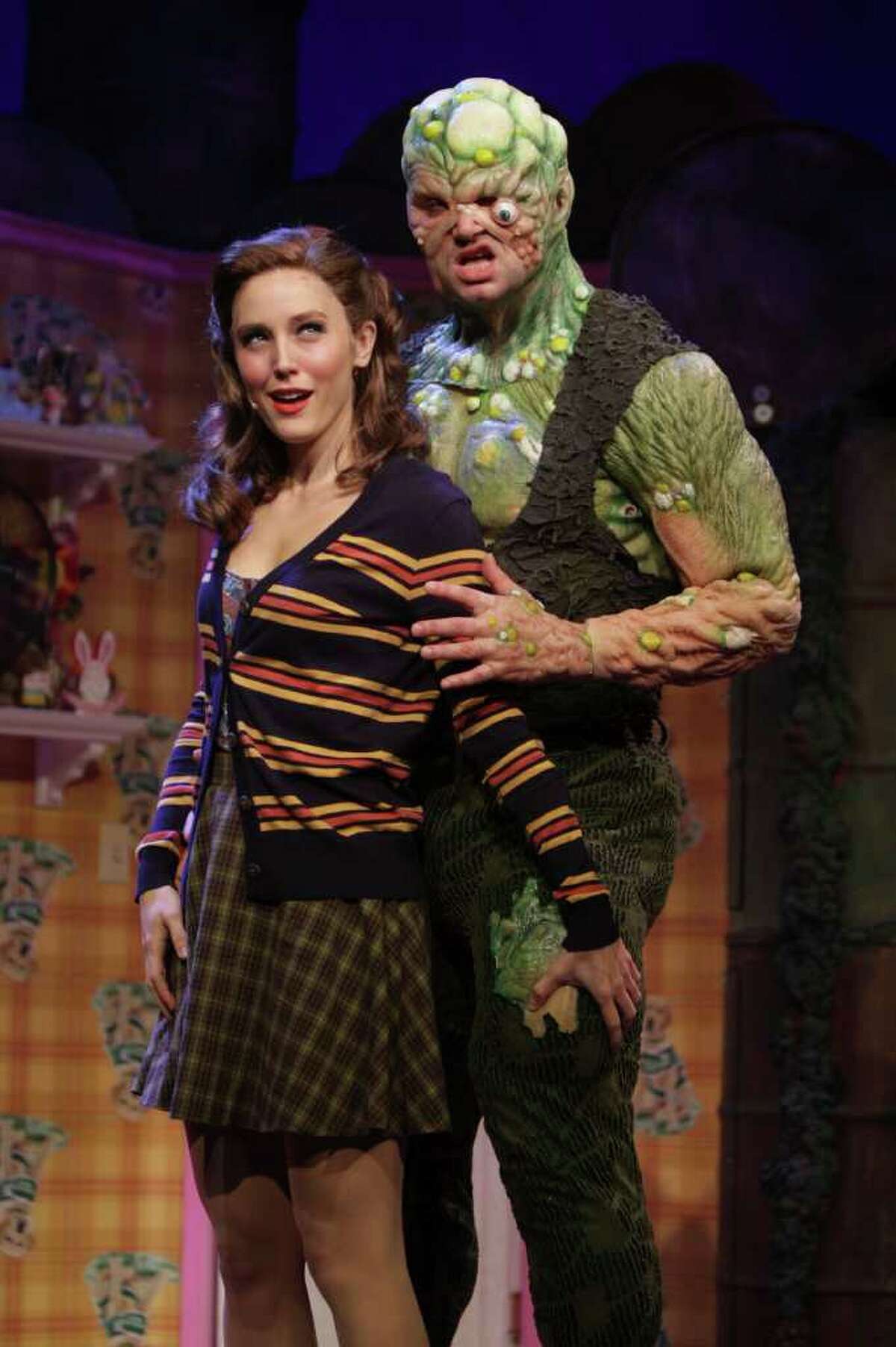 The Toxic Avenger, Constantine Maroulis, right, and his love interest Sarah the blind librarian, Mara Davi, during a dress rehearsal of the Toxic Avenger Tuesday, Jan. 10, 2012, in Houston. The Toxic Avenger will start January 13 and run until February 12. ( Nick de la Torre / Chronicle )