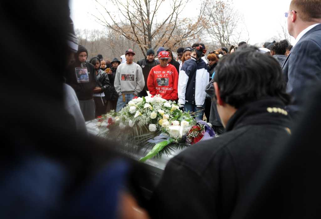 Mourners gather to remember slain teen