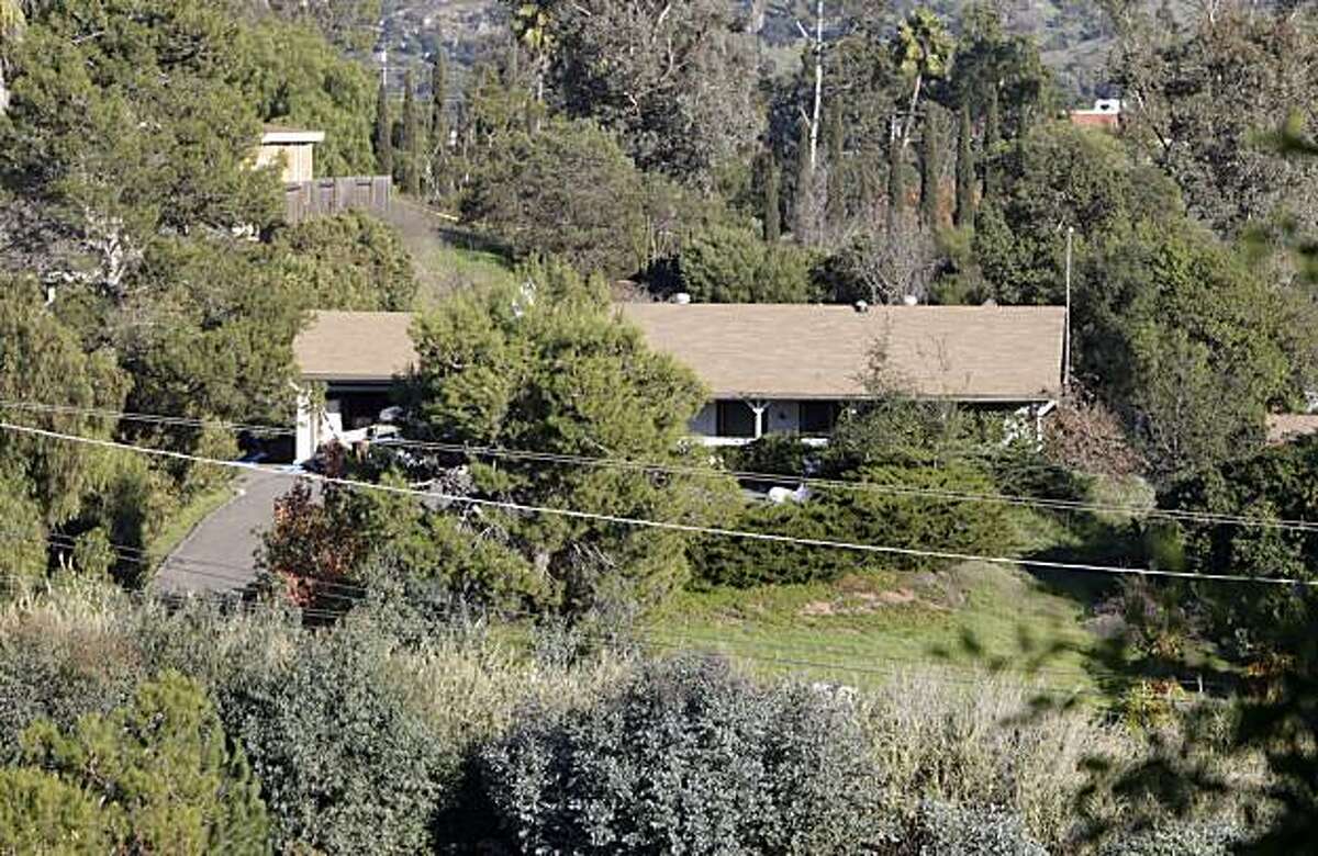 This Wednesday Dec. 1, 2010 photo shows a home in a wooded hilly neighborhood of Escondido, Calif., where authorities recently found what prosecutors said was the largest supply of homemade explosives in a single location in United States history. The home was rented and occupied by a George Djura Jakubec. Gov. Arnold Schwarzenegger has declared a state of emergency in San Diego County following the discovery of what police called a virtual bomb factory. Under the declaration Wednesday, the California Emergency Management Agency will coordinate efforts of all state agencies and provide assistance to San Diego County to remove the hazardous materials.