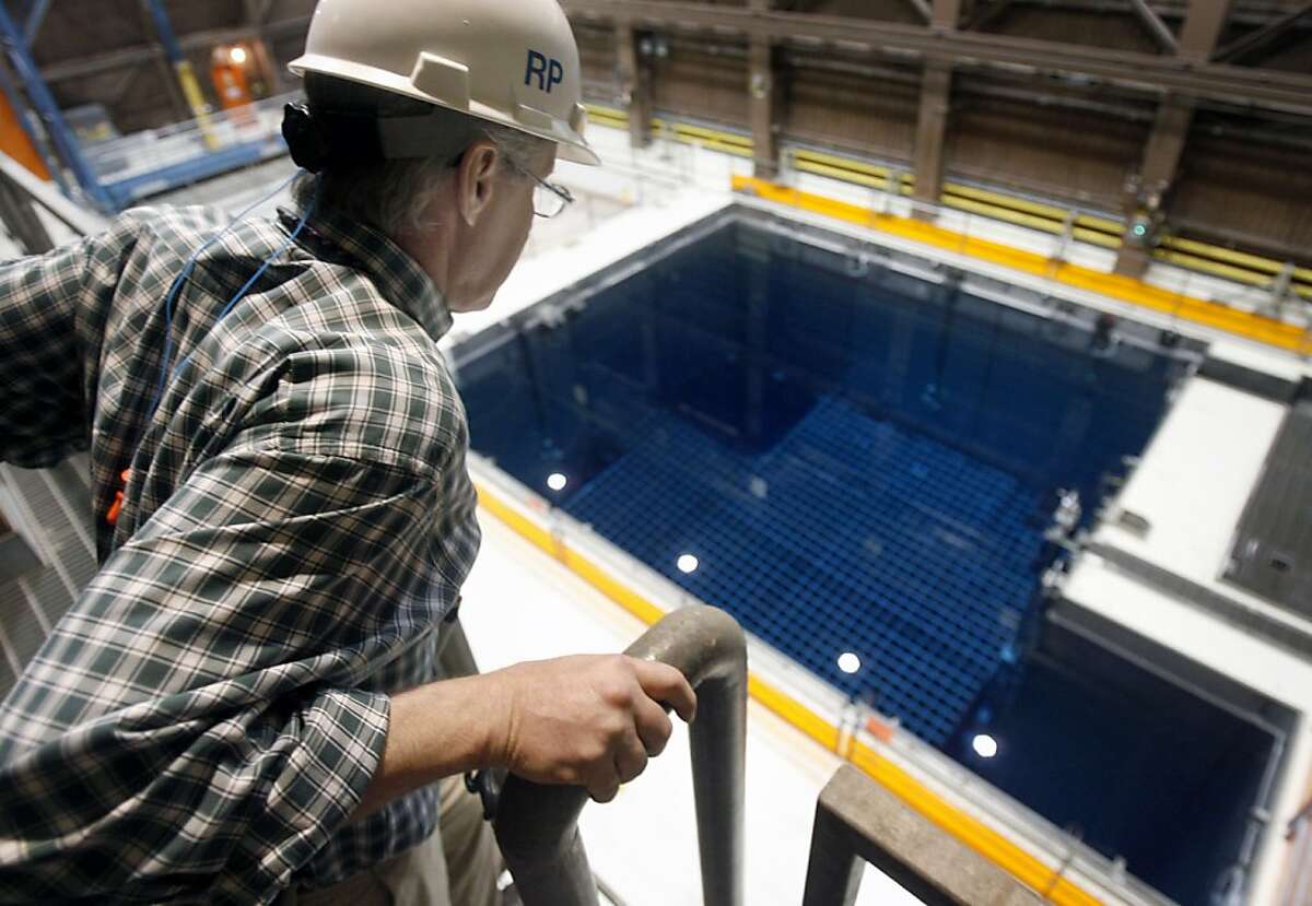 Radiation protection physicist Mark Somerville gets an overhead look at one of the spent fuel storage pool inside PG&E's Diablo Canyon nuclear power plant in Avila Beach, Calif. on Friday, May 26, 2006. The two spent fuel storage pools are nearing its capacity of 2,648 cells so plant officials are constructing a dry cask storage area to hold future radioactive fuel cell waste.