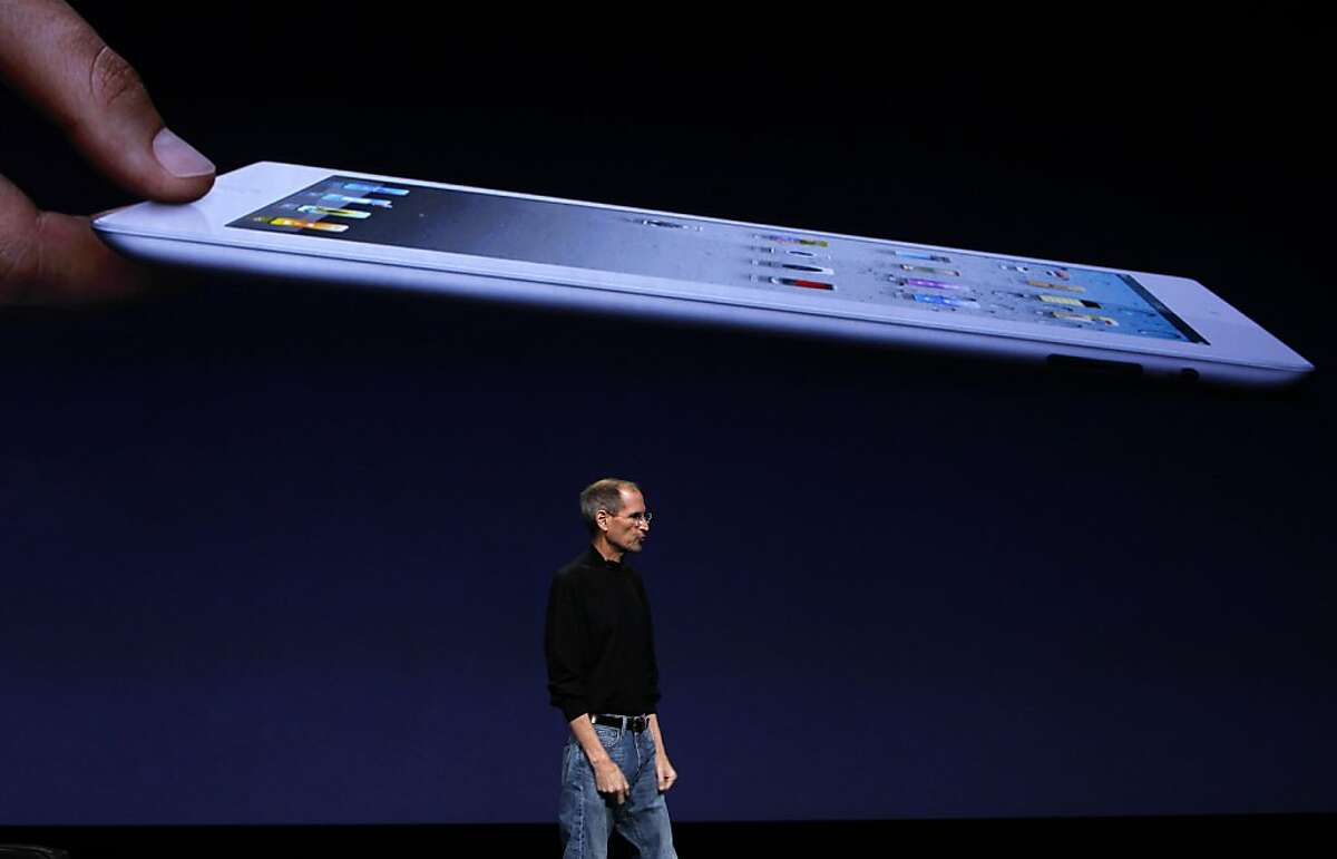 Apple CEO Steve Jobs unveils the iPad 2 second generation tablet at the Yerba Buena Center for the Arts in San Francisco, Calif., on Wednesday, March 2, 2011.