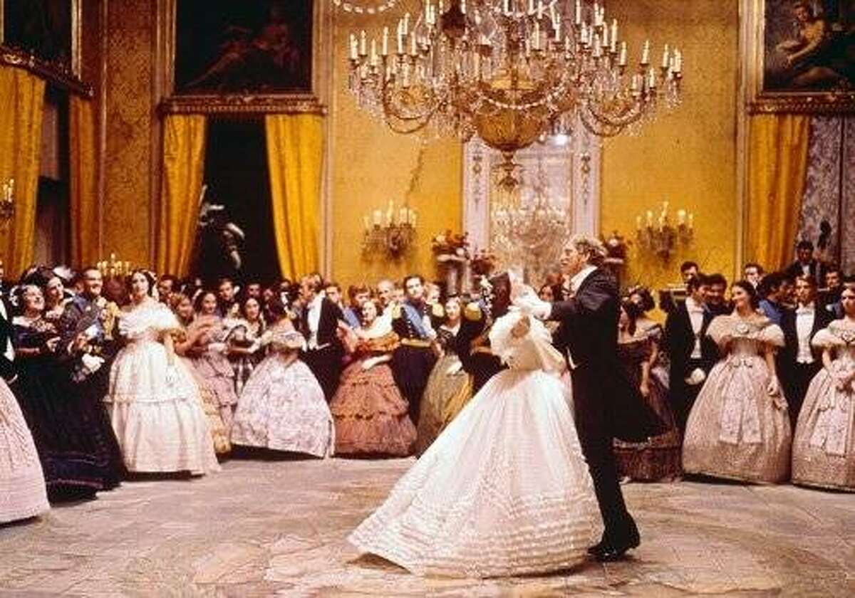 Burt Lancaster and Claudia Cardinale go for a spin in the classic ballroom sequence of Luchino Visconti's "The Leopard" (1963).