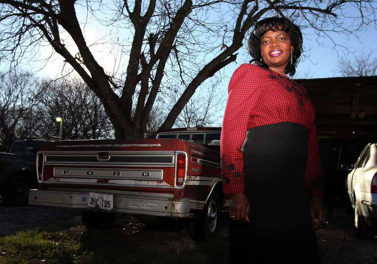 Doris Callies Dunlap stands beside a truck that her father, the late Rev. R.A. Callies, used for the first marches in honor of Martin Luther King, Jr. in San Antonio. Rev. Callies is credited as a founder of the march. Kin Man Hui/kmhui@express-news.net