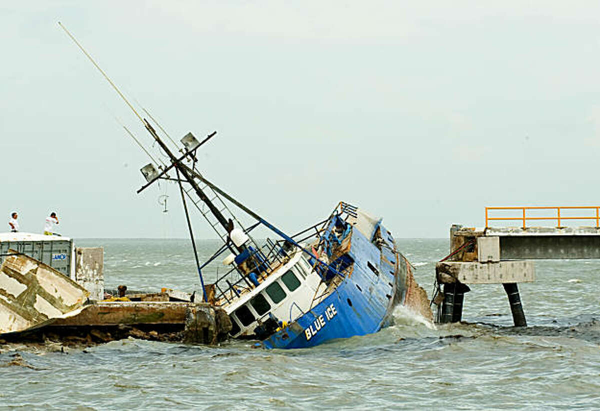 A shipwrecked boat hit by Hurricane Jimena, in Puerto San Carlos, Baja California state, Mexico, on September 2, 2009. Jimena crashed Wednesday into Mexico's Baja California, forcing thousands to seek emergency shelter as it buffeted islands off the coast with high winds and heavy rain. AFP PHOTO/Ronaldo SCHEMIDT (Photo credit should read Ronaldo Schemidt/AFP/Getty Images)