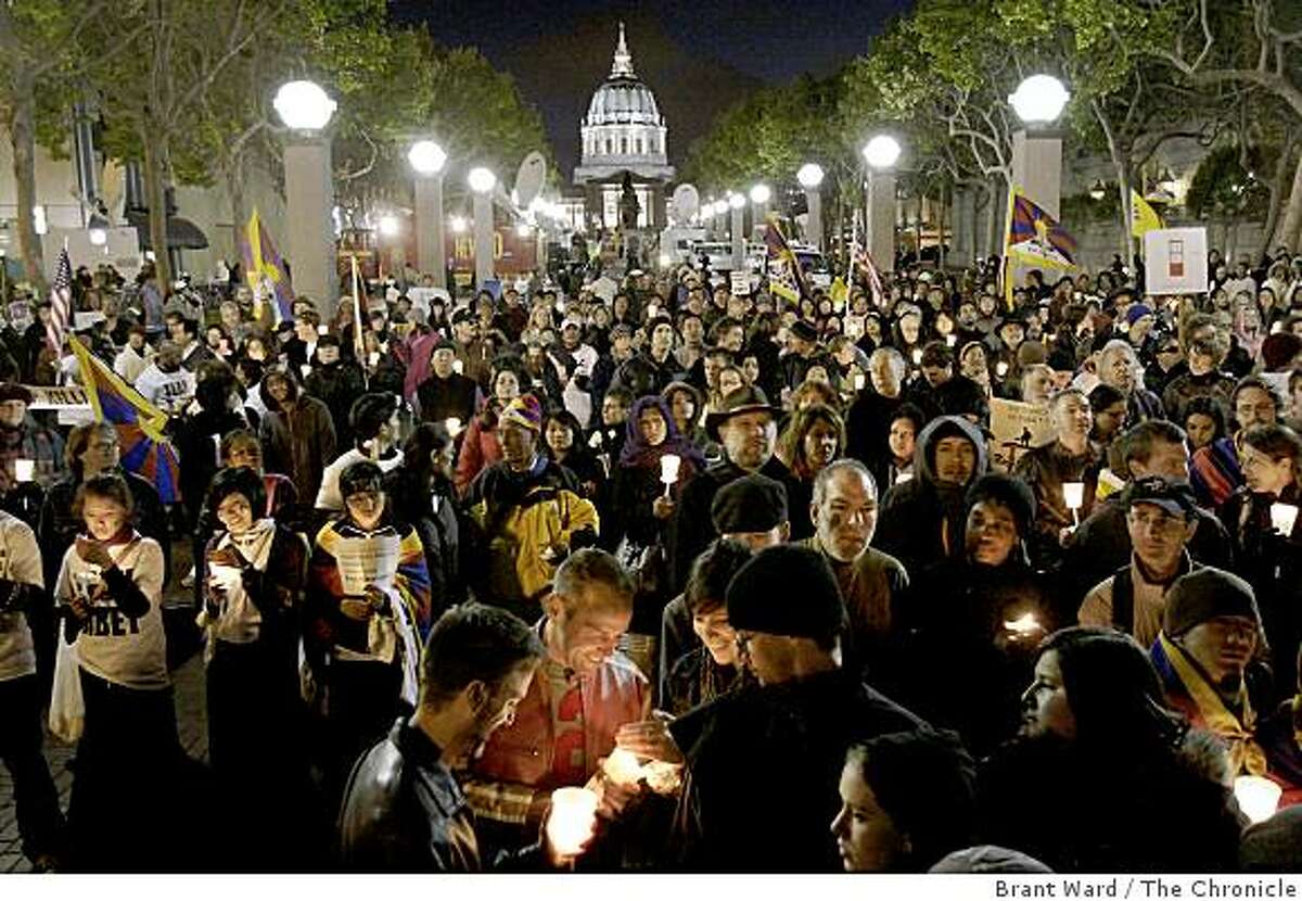 Even before the speakers were finished, the crowd lit their candles near the glow of San Francisco City Hall. Hundreds of Tibet supporters including actor Richard Gere and Archbishop Desmond Tutu took part in a candle light vigil near United Nations Plaza in San Francisco Tuesday, April 8, 2008.