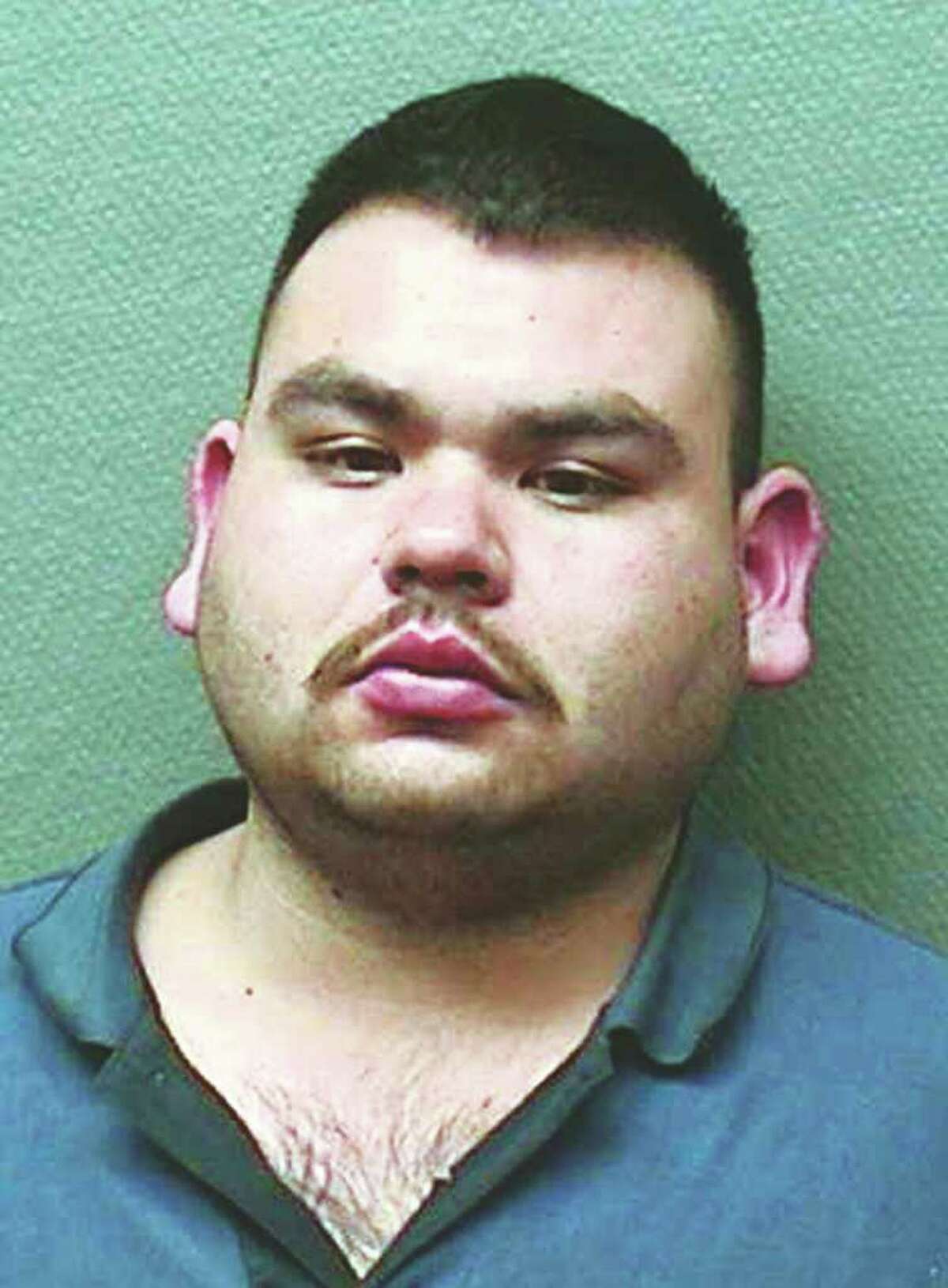 This undated photo provided by the Laredo Police Department shows Gerardo Castillo Chavez in Laredo, Texas. Castillo _ indicted in 2008 under the assumed name "Armando Garcia" and known as "Cachetes," or "cheeks" in Spanish, faces up to life in prison if convicted in U.S. District Court on conspiracy, drug and weapons charges. Jurors deliberated for about five hours Wednesday and were scheduled to resume discussions Thursday morning Feb. 4, 2010.