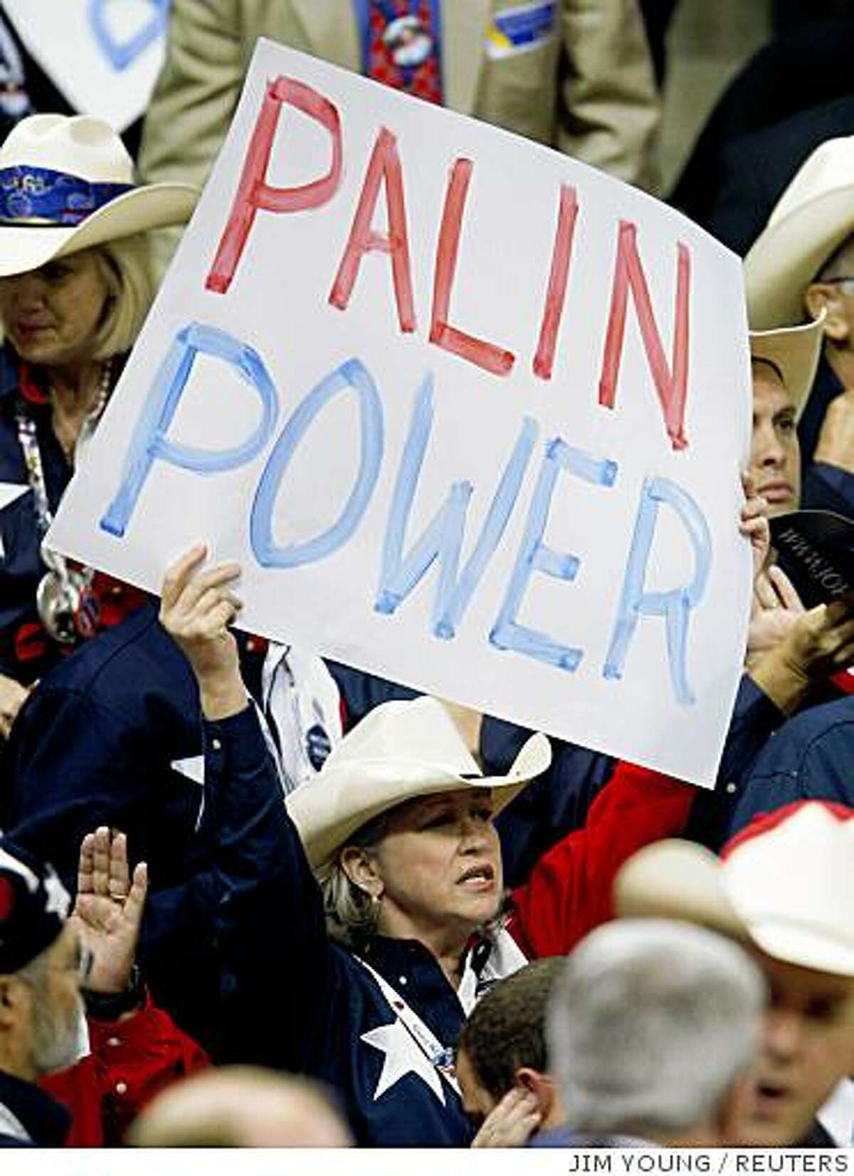 A member of the Texas delegation holds a sign supporting Republican US vice-presidential nominee, Alaska Gov. Sarah Palin,at the 2008 Republican National Convention in St. Paul, Minnesota, September 4, 2008. REUTERS/Jim Young (UNITED STATES) US PRESIDENTIAL ELECTION CAMPAIGN 2008 (USA)