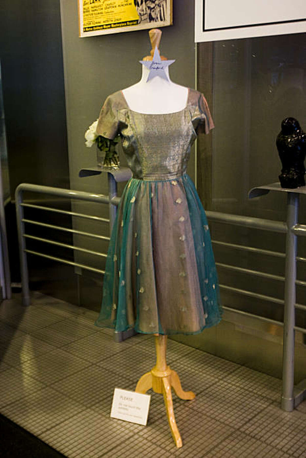 A dress worn by Joan Crawford hangs on display in the Metreon. Memorabilia from TV and movie stars is on display on the ground floor of the Metreon in San Francisco. The items are part of the "Hollywood Legends: The Barry Barsamian Collection" exhibit and will be on display until the end of May.