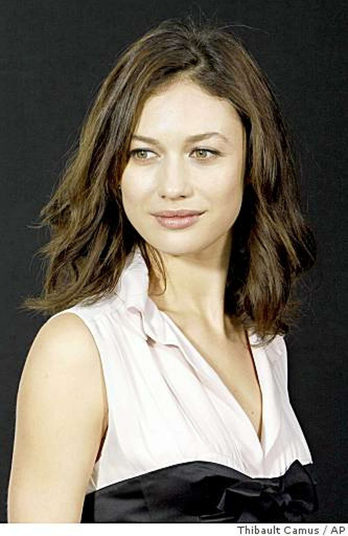 Ukrainian actress Olga Kurylenko is seen prior to the presentation of Chanel's Fall-Winter 2009-2010 ready-to-wear collection, Tuesday, March 10, 2009 in Paris.