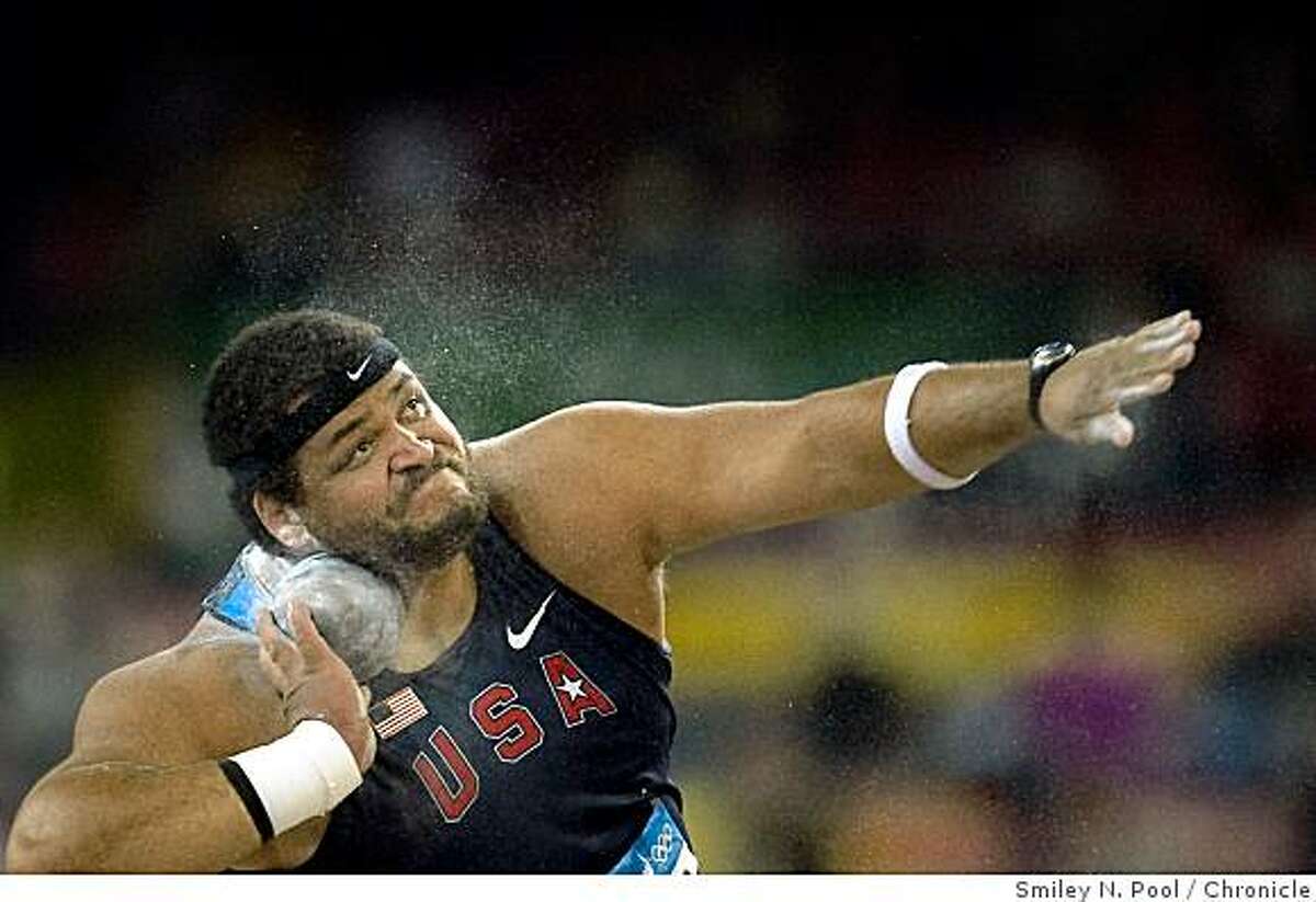 Reese Hoffa of the USA competes during the shot put finals on the first night of track and field (athletics) at the 2008 Summer Olympic Games, Friday, Aug. 15, 2008, in Beijing. ( Smiley N. Pool / Chronicle )