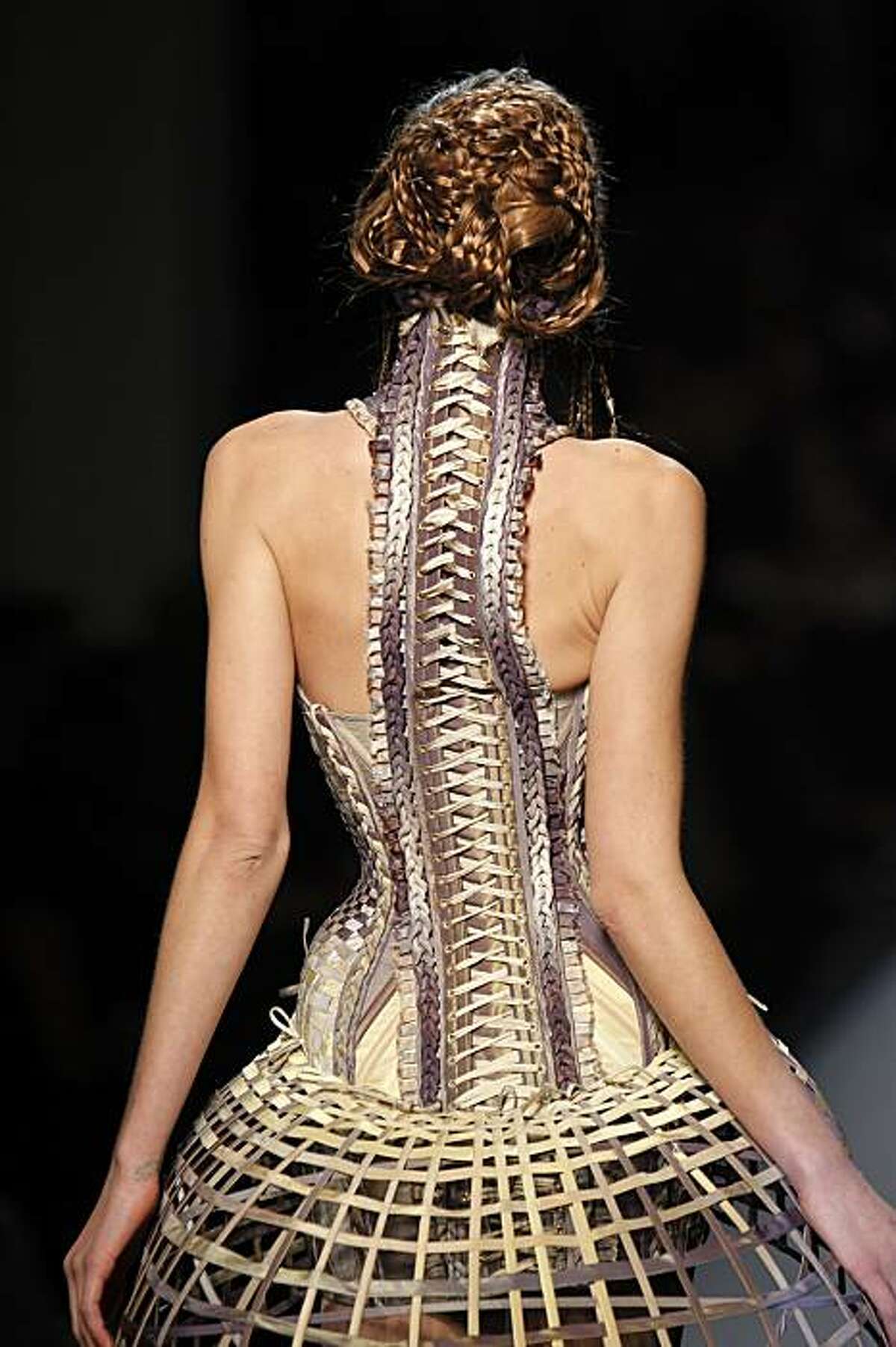 A model presents a creation by French designer Jean Paul Gaultier during the spring-summer 2010 haute couture collection show on January 27, 2010 in Paris.