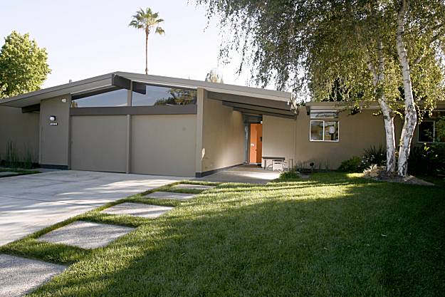 Redesigned Ranch Ranch home remodels that focus on original design and scale