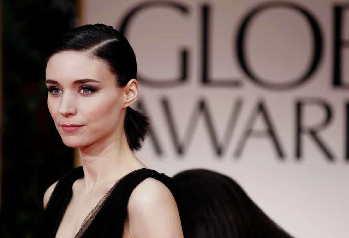 Rooney Mara arrives at the 69th Annual Golden Globe Awards Sunday, Jan. 15, 2012, in Los Angeles.