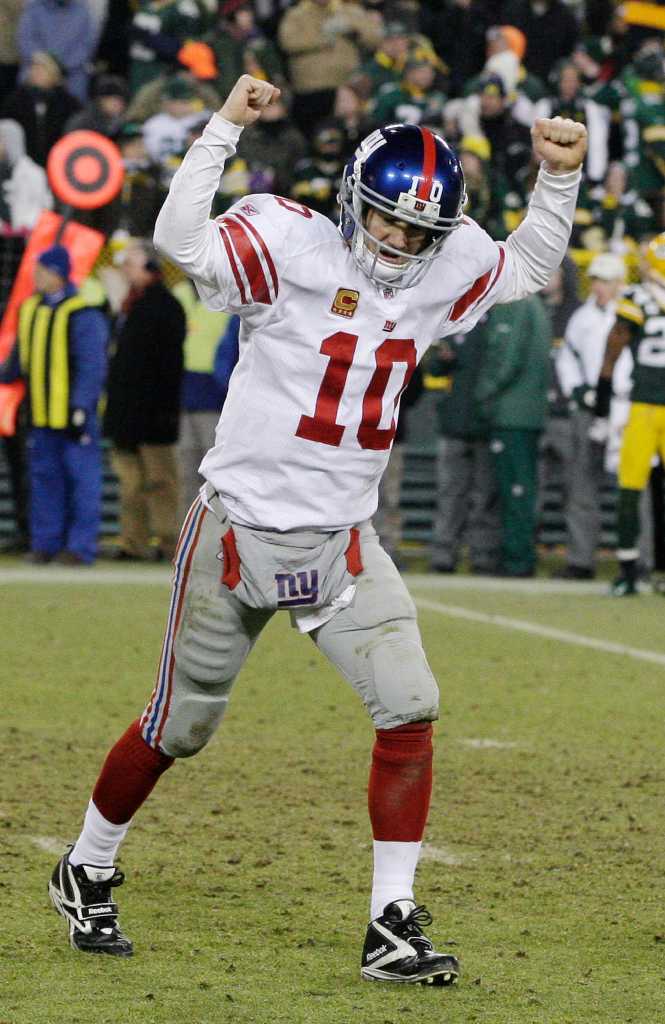 New York Giants fan Kevin Bock shows off his blue cheese hat before an NFL  divisional playoff football between the Green Bay Packers and the New York  Giants Sunday, Jan. 15, 2012