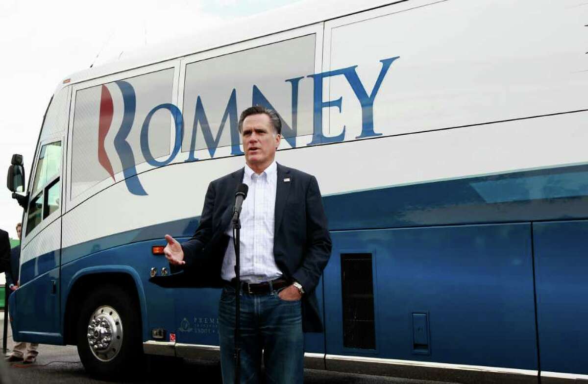 Republican presidential candidate, former Massachusetts Gov. Mitt Romney speaks to reporters after campaigning at the Florence Civic Center in Florence, S.C., Tuesday, Jan. 17, 2012. (AP Photo/Charles Dharapak)