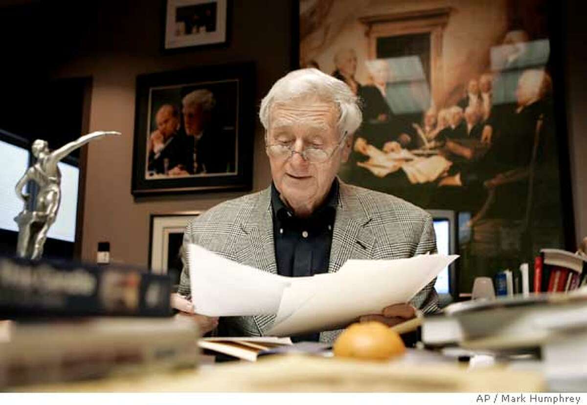 John Seigenthaler, a one-time administrative assistant to Robert Kennedy, works in his office on Monday, Dec. 5, 2005 in Nashville, Tenn. Wikipedia, the online encyclopedia that allows anyone to contribute articles, is tightening its rules for submitting entries following the disclosure that it ran a piece falsely implicating Seigenthaler in the Kennedy assassinations. Siegenthaler, USA Today's first editorial director, chairman emeritus and retired publisher and editor at the Tennessean in Nashville and a former president of the American Society of Newspaper Editors, said that Wikipedia's biography of him has been changed to remove the false accusations. (AP Photo/Mark Humphrey) Ran on: 12-06-2005 John Seigen- thaler Sr. says he was wrongly linked to the Kennedy brothers deaths. Ran on: 12-06-2005 John Seigen- thaler Sr. says he was wrongly linked to the Kennedy brothers deaths.